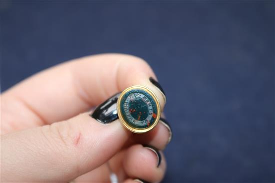 An early 20th century yellow metal and bloodstone set fob seal, 22mm.